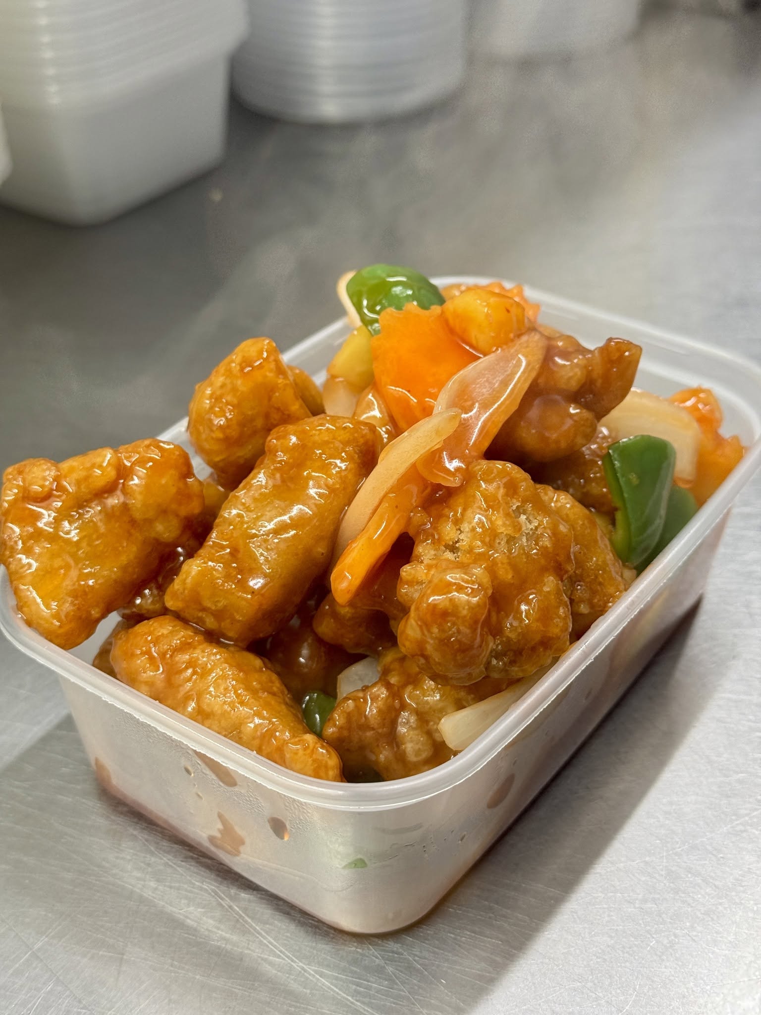 Sweet and sour chicken Cantonese style with onions and peppers